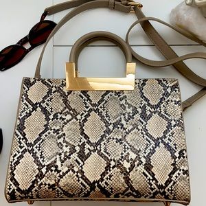 Tan snakeskin handbag